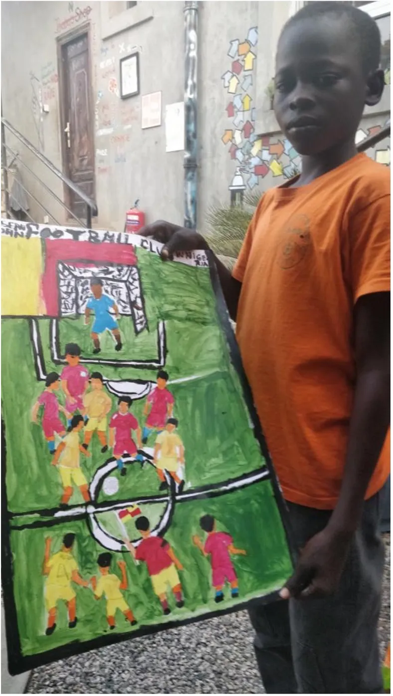 John Joseph with his winning painting